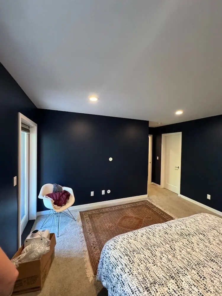 professionally painted room interior with navy blue walls in seattle wa